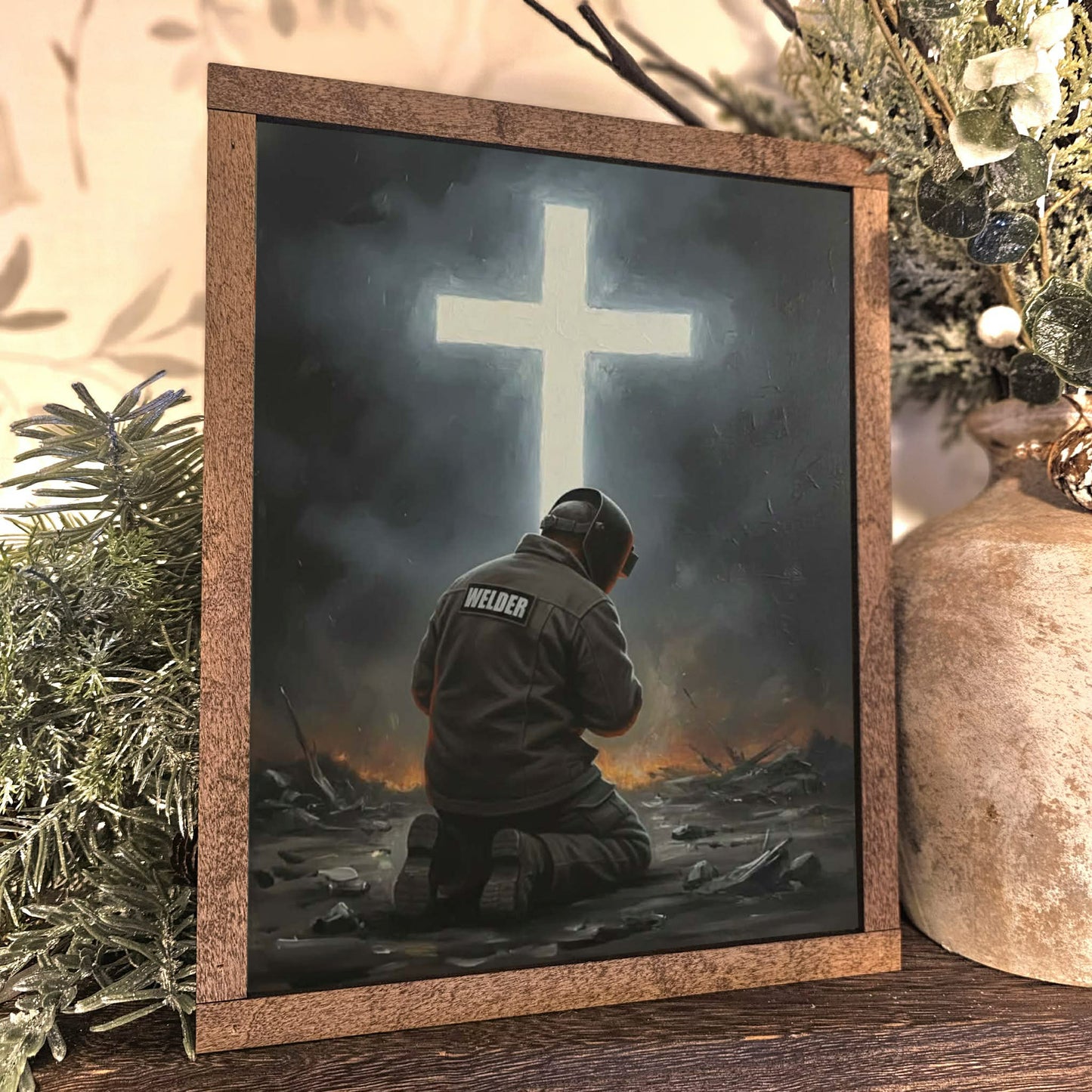 Welder Kneeling Before Cross Framed Art