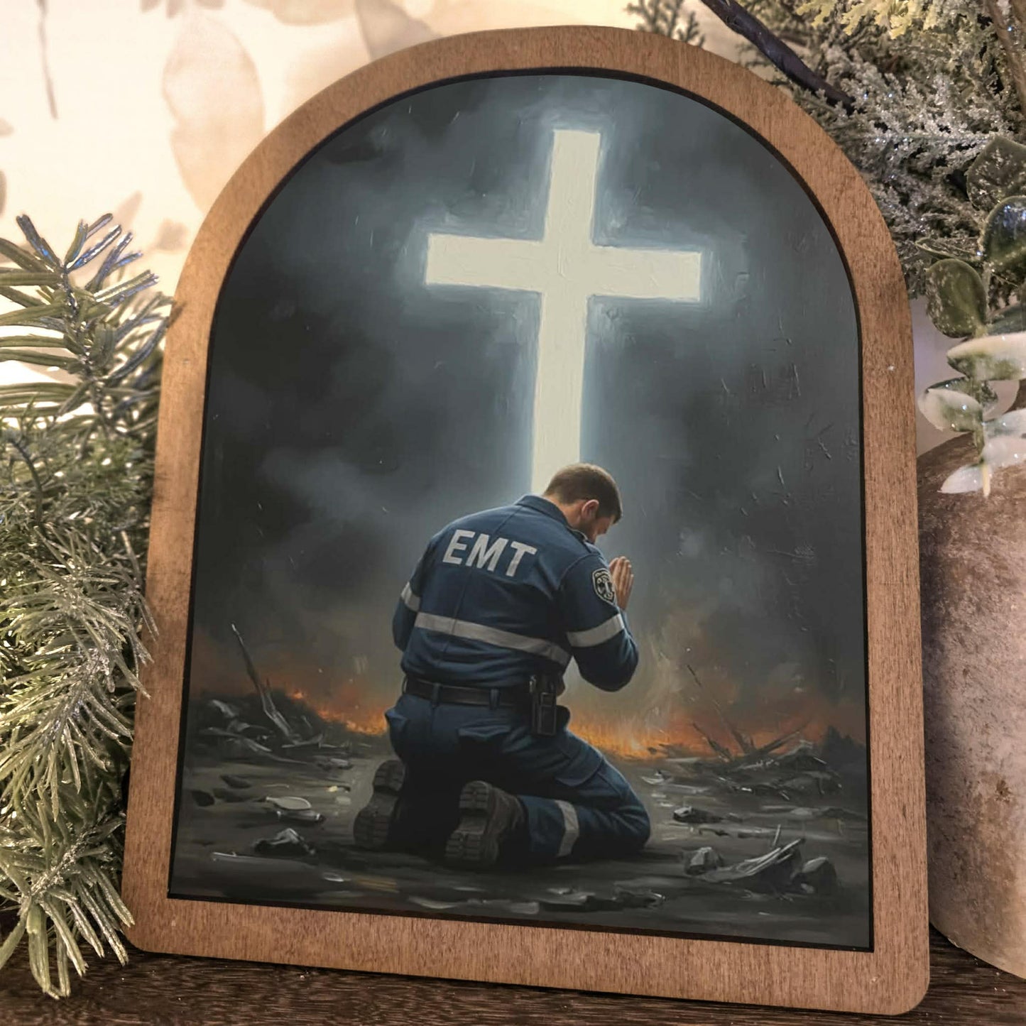 EMT Kneeling Before Cross Framed Art