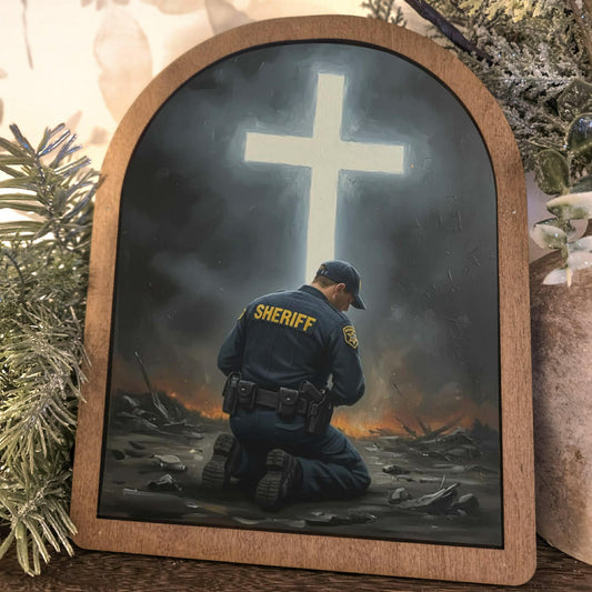 Sheriff Kneeling Before Cross Framed Art